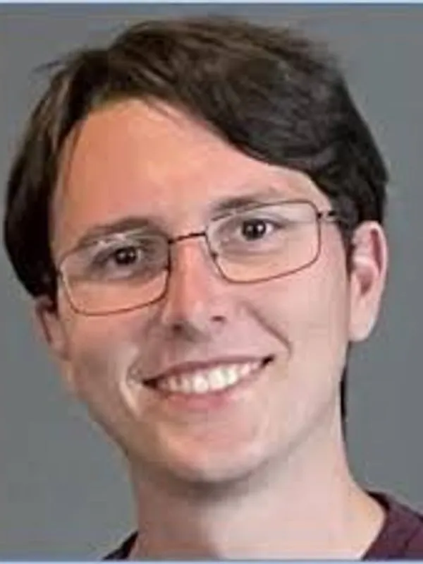 Headshot of James Scherrer.